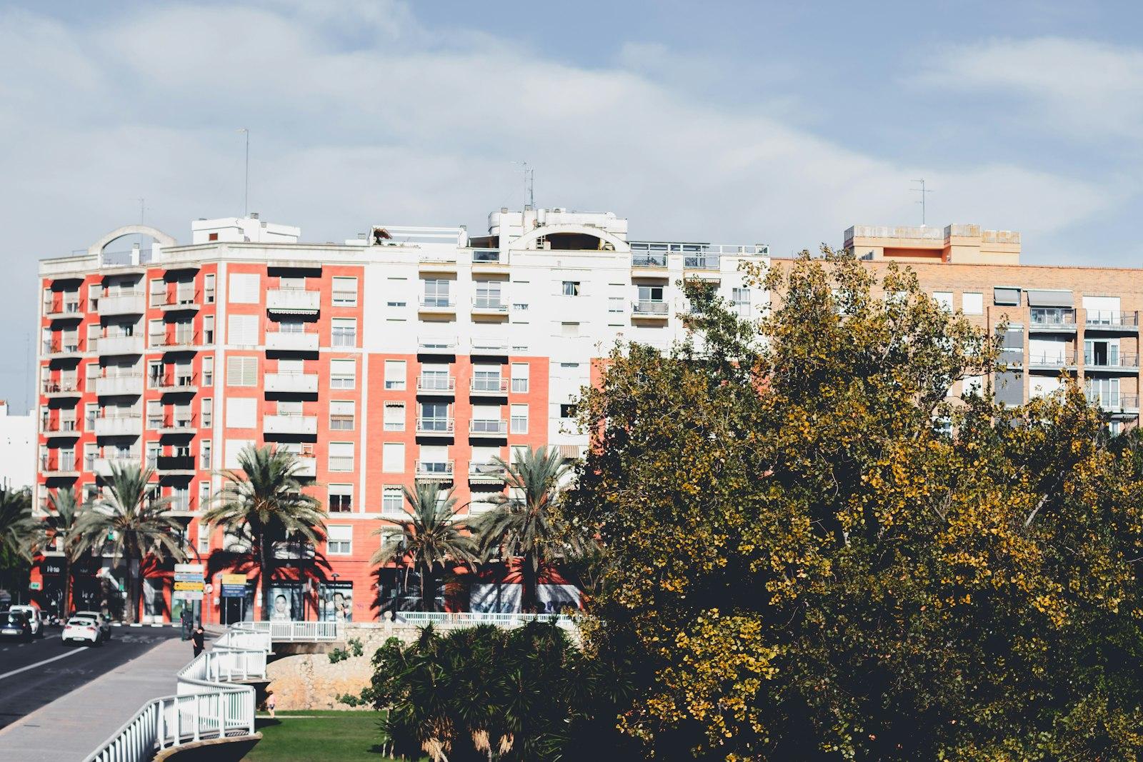 A view of a street with a building in the background